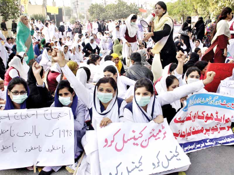 nurses stage a sit in near the lahore press club on monday photo abid nawaz express