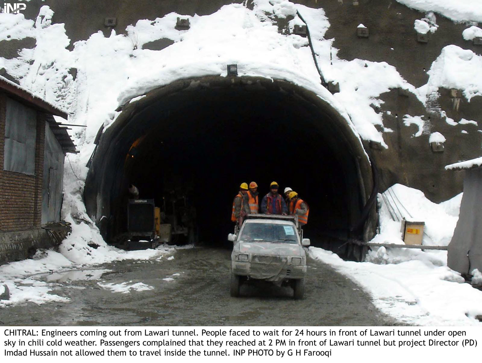 engineers exit the lowari tunnel after trying to reopen it photo inp