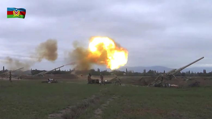 Video released by the Azerbaijan's Defense Ministry shows members of Azeri armed forces firing artillery during clashes between Armenia and Azerbaijan over the territory of Nagorno-Karabakh in an unidentified location, September 28, 2020. PHOTO: REUTERS