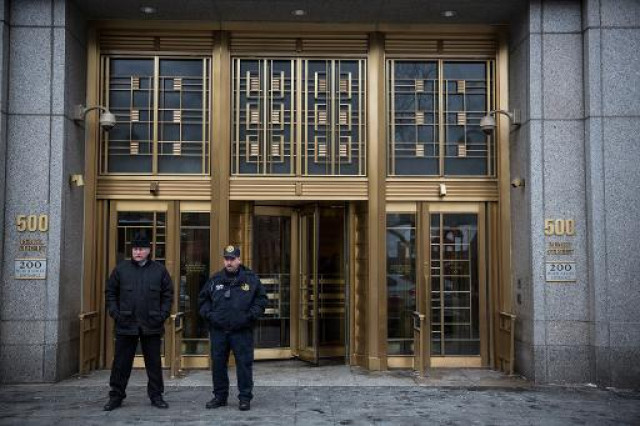 security guards stand outside federal court as the trial for osama bin laden 039 s son in law sulaiman abu ghaith begins on march 3 2014 in new york city photo afp