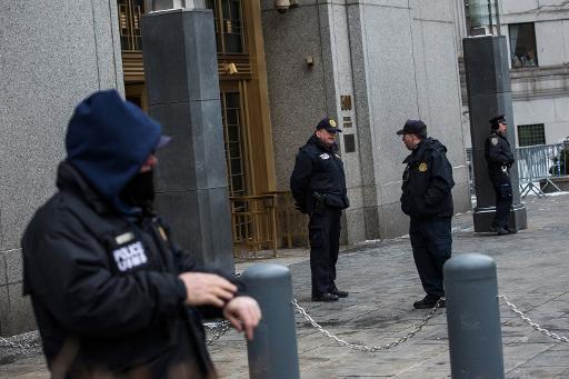 security guards stand outside federal court as the trial for osama bin laden 039 s son in law sulaiman abu ghaith begins on march 3 2014 in new york city photo afp