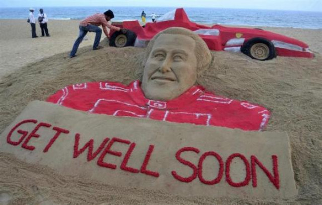 indian sand artist sudarshan pattnaik works on a sand sculpture of seven times formula one world champion michael schumacher to wish him a speedy recovery at puri in odisha photo reuters indian sand artist sudarshan pattnaik works on a sand sculpture of seven times formula one world champion michael schumacher to wish him a speedy recovery at puri in odisha photo reuters