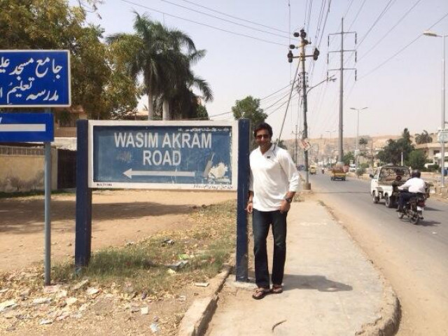 wasim akram standing next to a street sign of a road named after him photo twitter com wasimakramlive wasim akram standing next to a street sign of a road named after him photo twitter com wasimakramlive