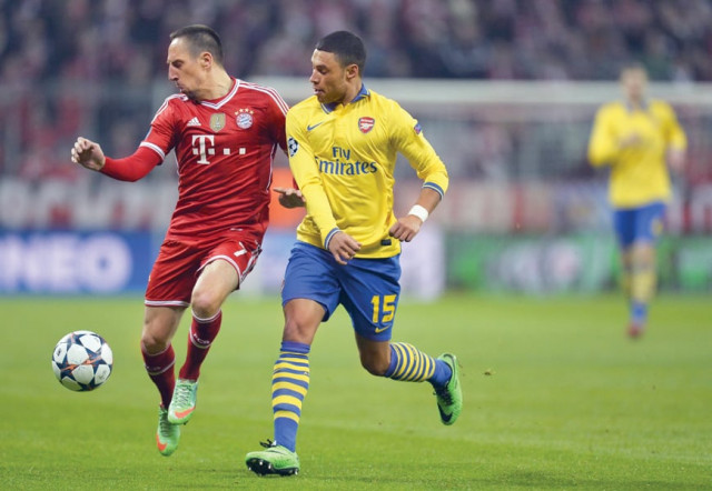 holders bayern munich booked their place in the champions league s quarter finals despite arsenal earning a 1 1 draw in tuesday s last 16 second leg clash photo afp holders bayern munich booked their place in the champions league s quarter finals despite arsenal earning a 1 1 draw in tuesday s last 16 second leg clash photo afp