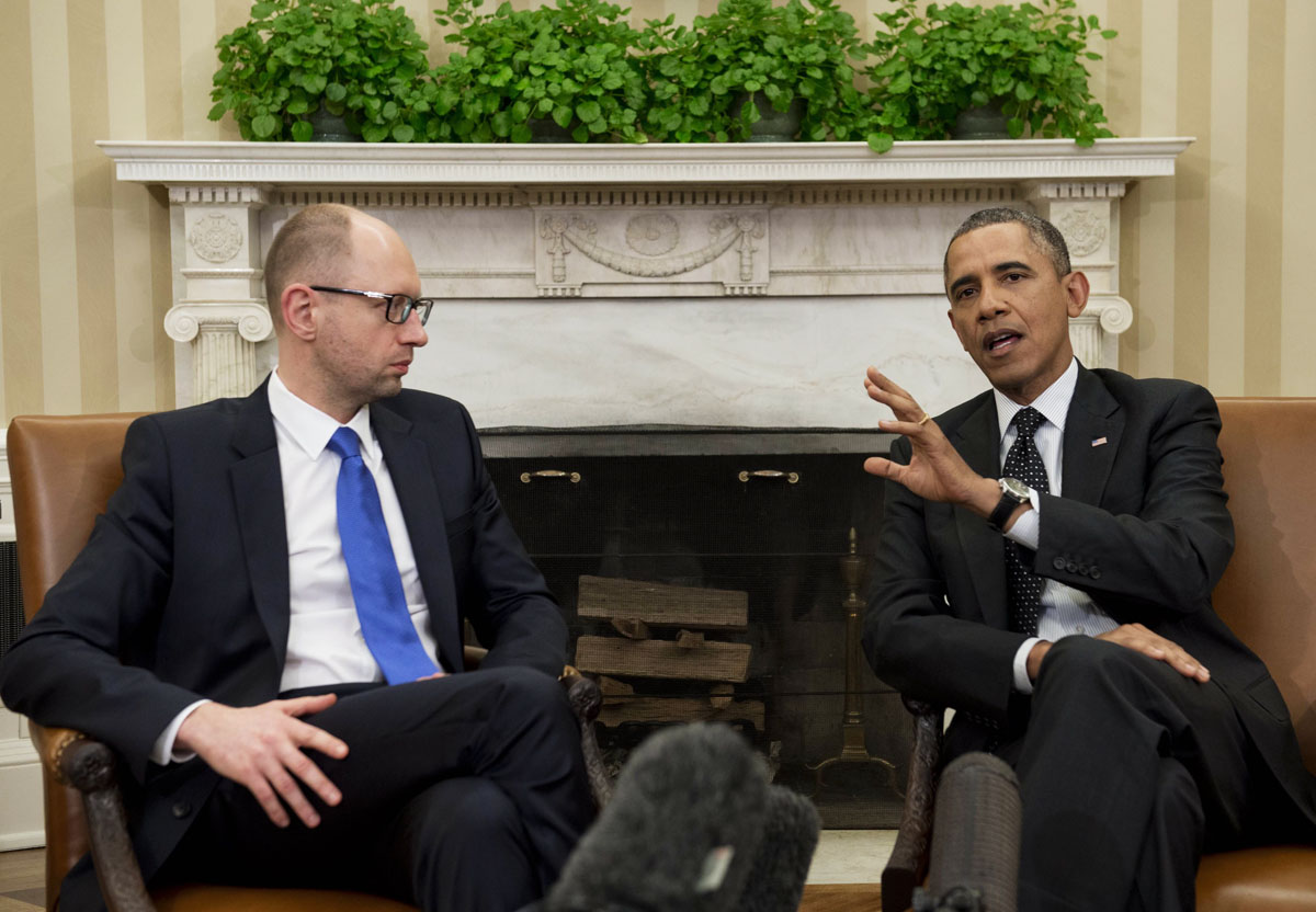 us president barack obama and ukrainian prime minister arseniy yatsenyuk during meetings in the oval office of the white house in washington dc march 12 2014 photo afp