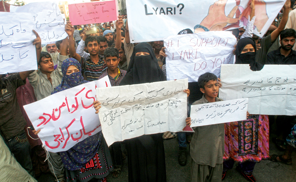 hundreds of lyari residents protested outside the karachi press club on thursday blaming the government of patronising the gangsters in the area photo athar khan express