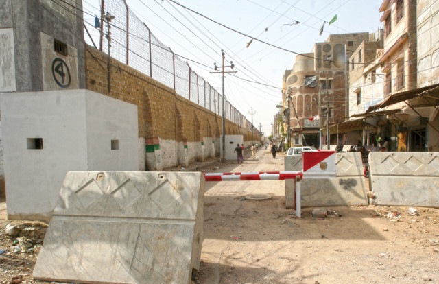 with barriers and concrete blocks jail authorities have restricted access to ghousia colony located next to the karachi prison on university road the barrier is locked and only opened for law enforcers and prison vans photos athar khan express with barriers and concrete blocks jail authorities have restricted access to ghousia colony located next to the karachi prison on university road the barrier is locked and only opened for law enforcers and prison vans photos athar khan express