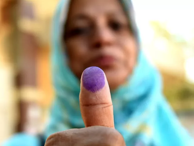 a pakistani woman poses showing her ink marked thumb after casting her ballot at a polling station in karachi on december 5 2015 during local government elections photo afp a pakistani woman poses showing her ink marked thumb after casting her ballot at a polling station in karachi on december 5 2015 during local government elections photo afp