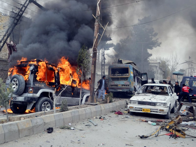 a car burns at the site of the bomb blast in quetta photo banaras khan express a car burns at the site of the bomb blast in quetta photo banaras khan express