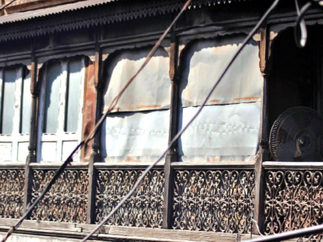 a crumbling balcony in one of the houses situated in the bazaar photo express a crumbling balcony in one of the houses situated in the bazaar photo express