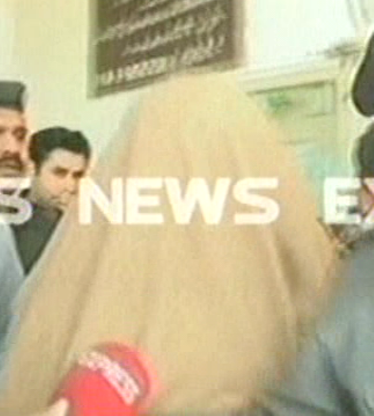 express news screengrab of the suspect with his face covered