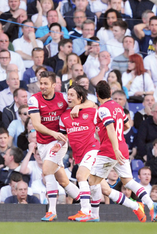 czech midfielder tomas rosicky took just 72 seconds to open the scoring at white hart lane on sunday with a sublime half volley from an acute angle photo afp czech midfielder tomas rosicky took just 72 seconds to open the scoring at white hart lane on sunday with a sublime half volley from an acute angle photo afp
