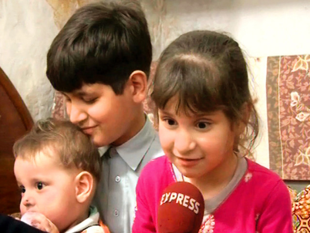 this tv grab shows mohib shah s children talking to express news photo express this tv grab shows mohib shah s children talking to express news photo express