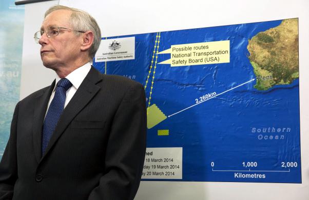 john young general manager of the emergency response division of the australian maritime safety authority amsa stands in front of a diagram showing the search area for malaysia airlines flight mh370 during a briefing in canberra march 20 2014 photo reuters