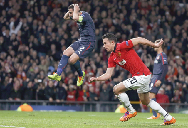 robin van persie scored a hat trick as manchester united kept their season alive by storming back to beat olympiakos photo afp robin van persie scored a hat trick as manchester united kept their season alive by storming back to beat olympiakos photo afp