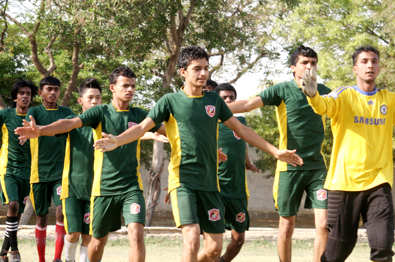 under 18 players warm up before training the children will compete at the street child world cup 2014 in rio de janeiro photo athar khan express