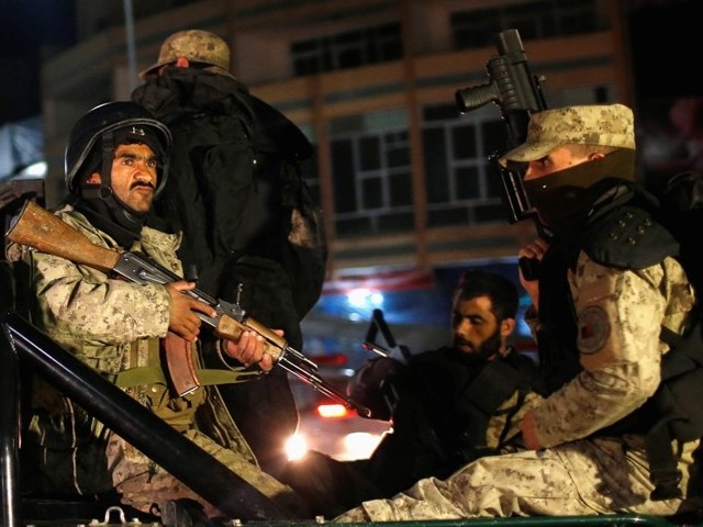 afghan security personnel arrive near the serena hotel during an attack in kabul march 20 2014 photo reuters