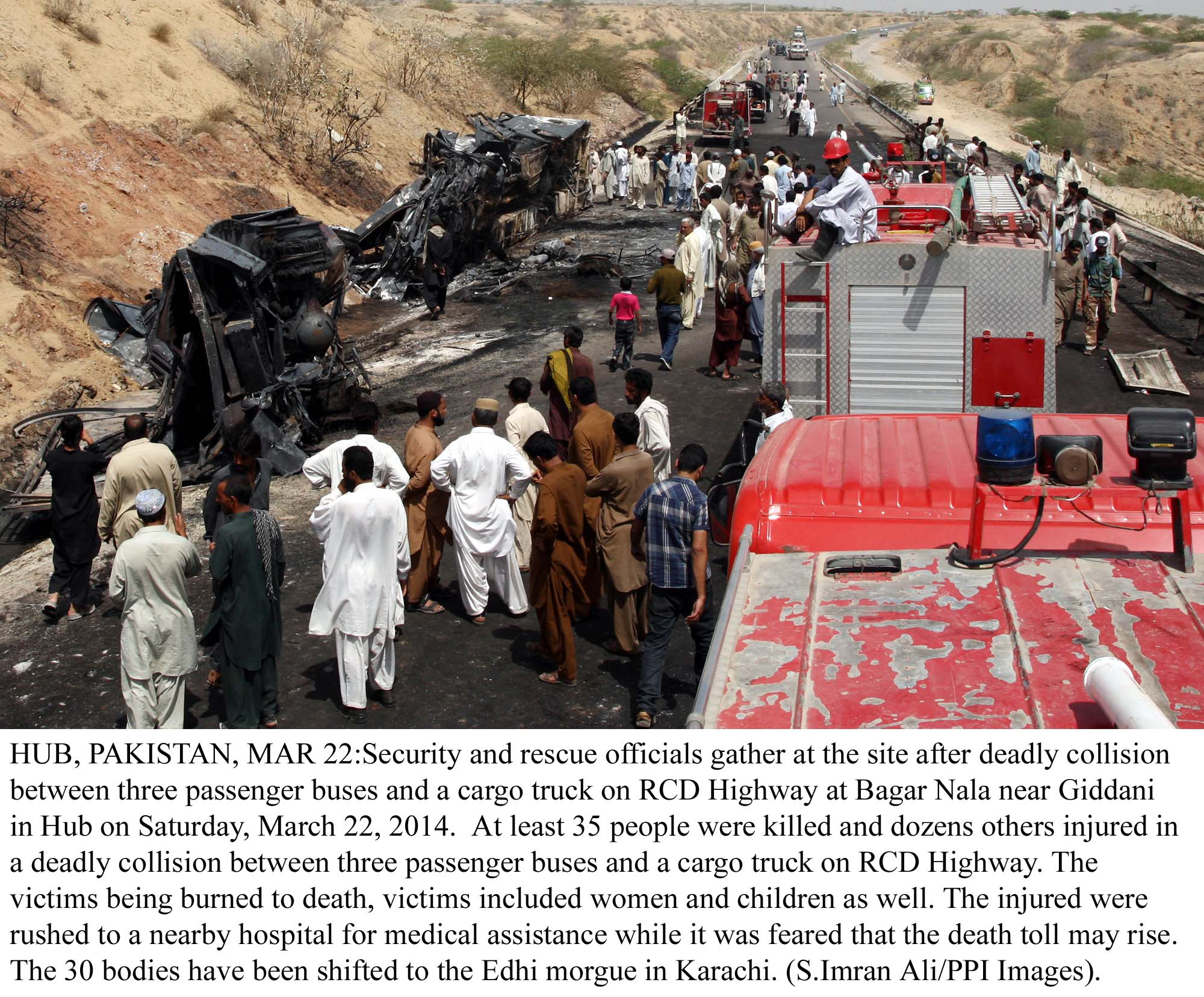 rescue workers officials and locals gather at the site of a suspected collision on the rcd highway near gadani photo ppi