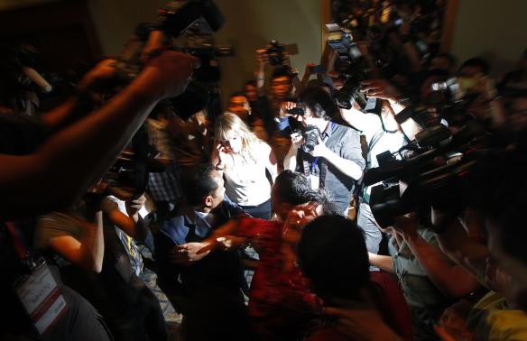 family members of chinese passengers aboard mh370 confront malaysian officials photo file