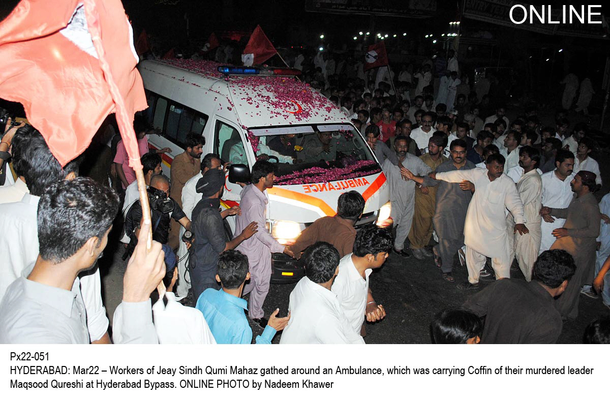 workers of jeay sindh qaumi mahaz jsqm gather around the ambulance which was carrying the body of maqsood qureshi near hyderabad bypass photo online