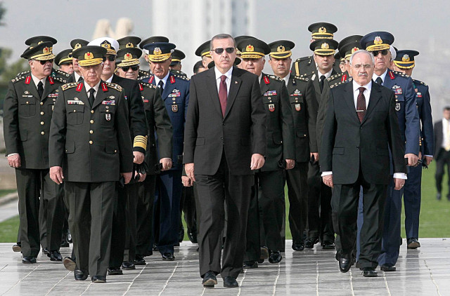 a file photo from 2010 shows prime minister recep tayyip erdogan c attending a wreath laying ceremony with members of the supreme military council at the mausoleum of mustafa kemal ataturk erdogan on march 23 2014 congratulated the military for downing a syrian warplane near its border photo afp file a file photo from 2010 shows prime minister recep tayyip erdogan c attending a wreath laying ceremony with members of the supreme military council at the mausoleum of mustafa kemal ataturk erdogan on march 23 2014 congratulated the military for downing a syrian warplane near its border photo afp file