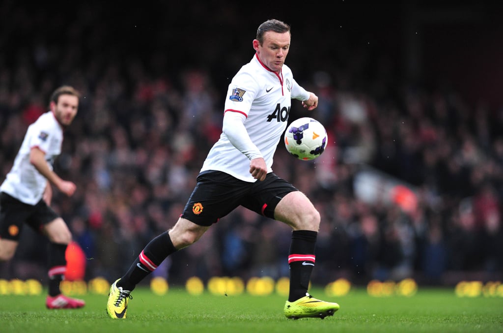 manchester united 039 s english striker wayne rooney shoots to score the opening goal during the english premier league football match between west ham united and manchester united at the boleyn ground upton park in london on march 22 2014 photo afp