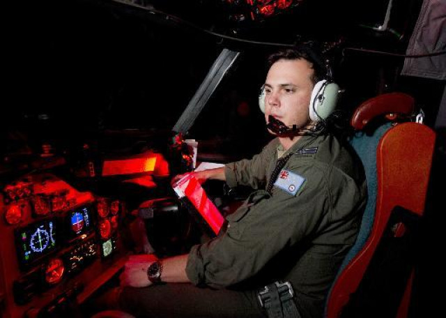australian planes find two objects in search of mh370 photo afp australian planes find two objects in search of mh370 photo afp
