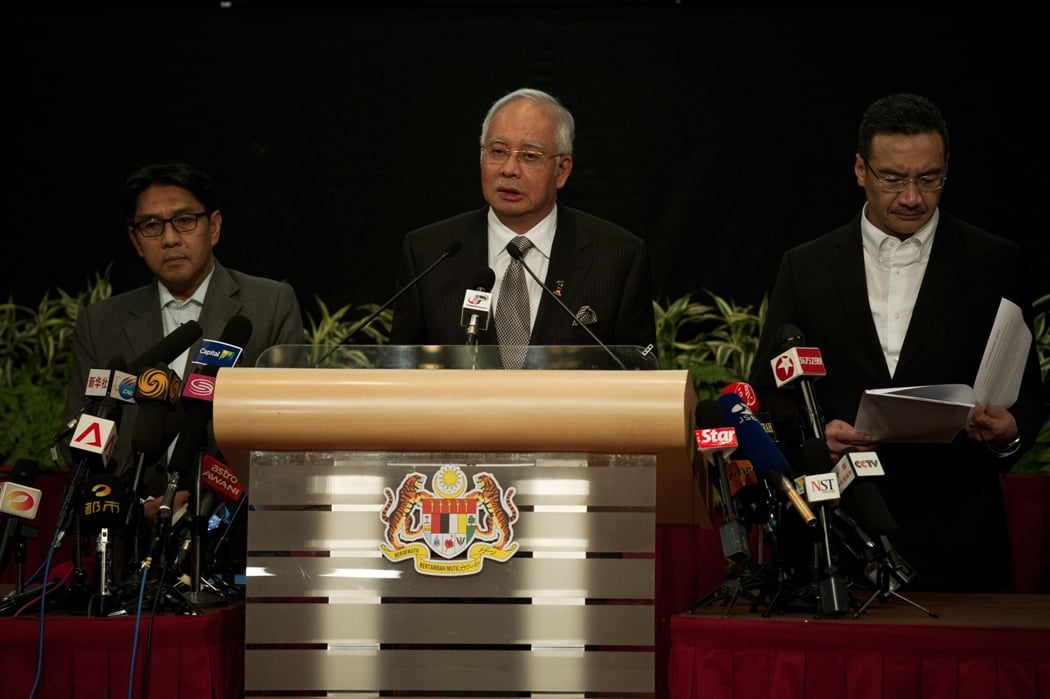 malaysian prime minister najib razak c delivers a statement on the missing malaysia airlines flight mh370 during a press conference at the putra world trade center pwtc in kuala lumpur on march 24 2014 the malaysian prime minister on march 24 said that the flight of the missing malaysian airlines mh370 ended in the southern indian ocean photo afp