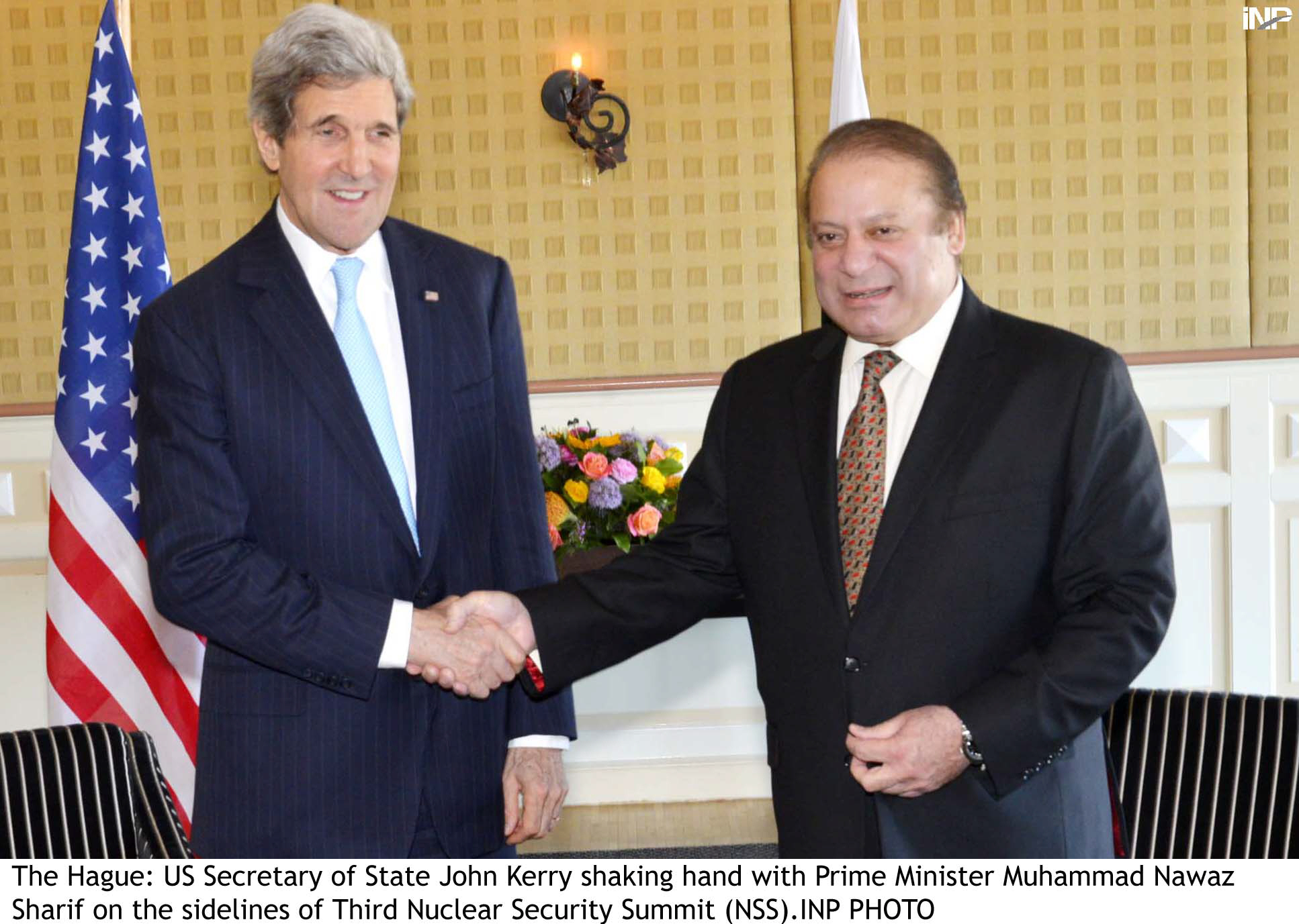 us secretary of state john kerry shakes hands with pm nawaz sharif photo inp