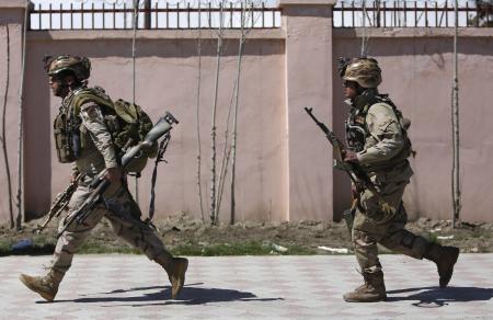 afghan security personnel arrive at the scene of an attack in kabul near afghan presidential candidate 039 s home photo reuters