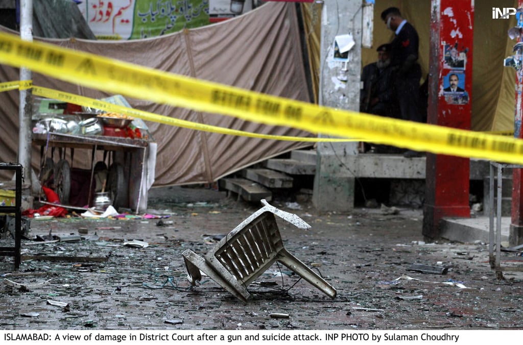 a view of damage in district court in islamabad after a gun and suicide attack on monday march 3 2014 photo inp file
