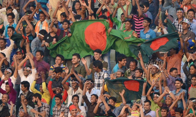 bangladeshi fans waving the bangladeshi flag at a cricket match photo afp file