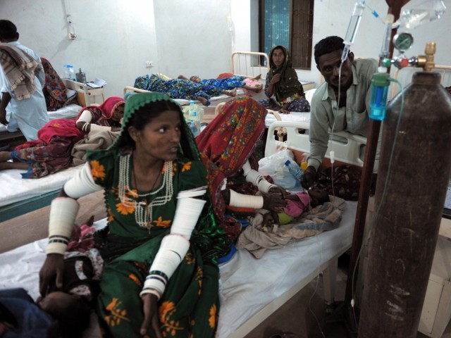 villagers tending to their sick children affected by a famine at a hospital in mithi the capital of tharparkar district photo afp