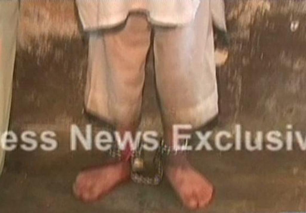 an express news screengrab showing the chained child