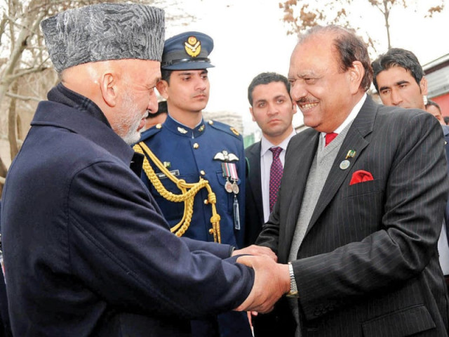 president hamid karzai receiving president mamnoon hussain at presidential palace in kabul photo nni president hamid karzai receiving president mamnoon hussain at presidential palace in kabul photo nni