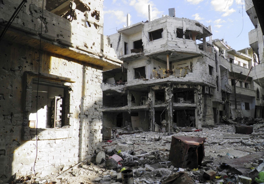file photo of buildings in syria riddled with bullets photo reuters file
