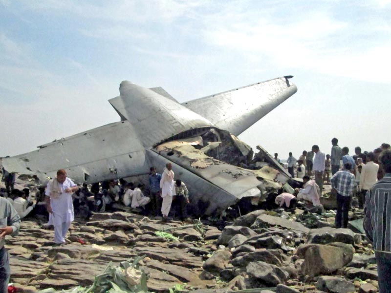 onlookers surround cargo plane which crashed in central madhya pradesh photo afp