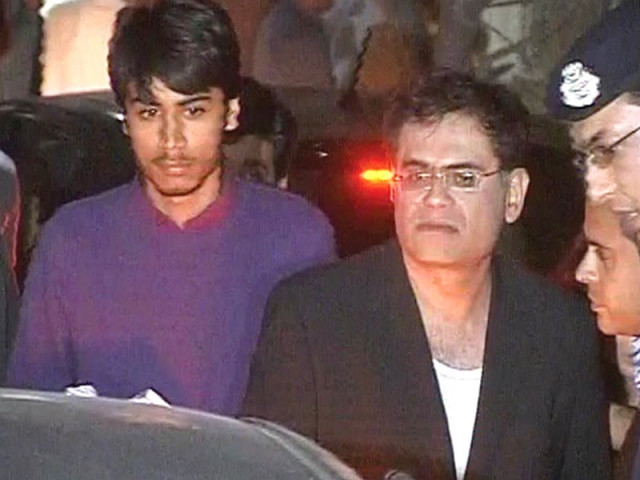 express news tv grab shows the anchorperson as he is escorted from the hospital express news tv grab shows the anchorperson as he is escorted from the hospital