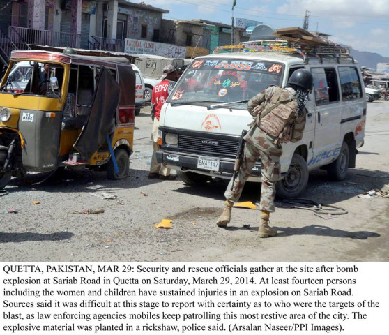 a security official inspects the site of a bomb blast on sariab road in quetta on saturday photo ppi a security official inspects the site of a bomb blast on sariab road in quetta on saturday photo ppi