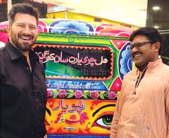tapu javeri poses with truck art painter haider ali who has painted tapu yaar tung na kar on all his buses tapu javeri poses with truck art painter haider ali who has painted tapu yaar tung na kar on all his buses