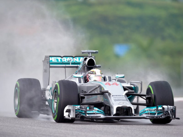 lewis hamilton won pole position in a rainy qualification round for the malaysian grand prix repeating his success in melbourne two weeks ago photo afp lewis hamilton won pole position in a rainy qualification round for the malaysian grand prix repeating his success in melbourne two weeks ago photo afp