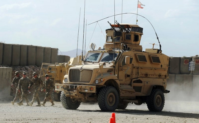a file photo of us soldiers of the 10th mountain division walk past an armoured vehicle at the forward operating base in ghazni on may 23 2013 photo afp a file photo of us soldiers of the 10th mountain division walk past an armoured vehicle at the forward operating base in ghazni on may 23 2013 photo afp