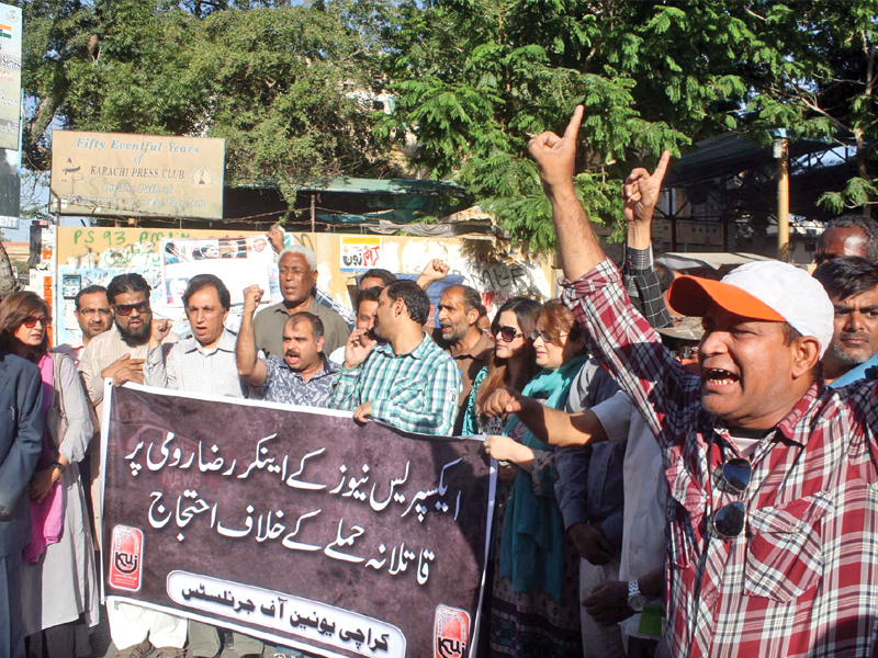 members of the karachi union of journalists chant slogans outside the karachi press club during a protest against the attack on express news anchorperson raza rumi photo ppi