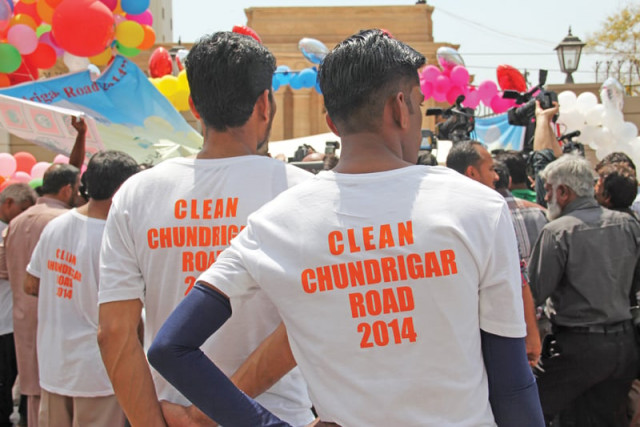 sanitary staff of the kmc the dmcs and private and government banks swept ii chundrigar road on their day off on sunday the event was part of the clean chundrigar road 2014 campaign photos ayesha mir express sanitary staff of the kmc the dmcs and private and government banks swept ii chundrigar road on their day off on sunday the event was part of the clean chundrigar road 2014 campaign photos ayesha mir express