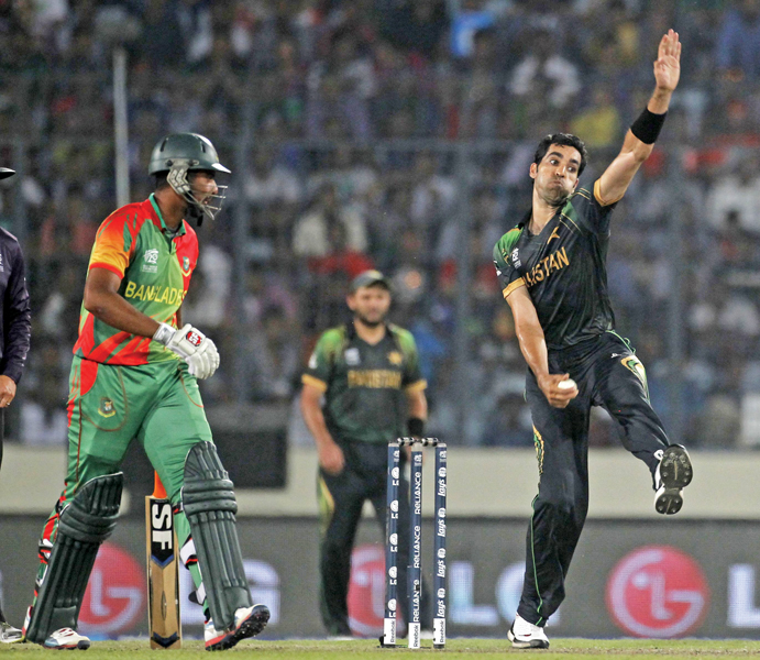 umar gul finishes with a crucial three for 30 against bangladesh as pakistan stay in contention for a spot in the last four photo afp