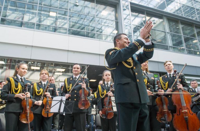 the choir of the national institute of culture of ukraine the choir of the children opera house of ukraine the presidential orchestra of ukraine and the national military orchestra of ukraine play at the zhulyany airport in kiev on march 30 2014 photo afp the choir of the national institute of culture of ukraine the choir of the children opera house of ukraine the presidential orchestra of ukraine and the national military orchestra of ukraine play at the zhulyany airport in kiev on march 30 2014 photo afp
