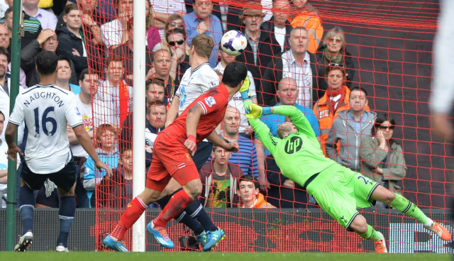 tottenham hotspur 039 s french goalkeeper hugo lloris r dives to save a header from liverpool 039 s uruguayan striker luis suarez l during the english premier league football match between liverpool and tottenham hotspur at anfield in liverpool northwest england on march 30 2014 photo afp tottenham hotspur 039 s french goalkeeper hugo lloris r dives to save a header from liverpool 039 s uruguayan striker luis suarez l during the english premier league football match between liverpool and tottenham hotspur at anfield in liverpool northwest england on march 30 2014 photo afp