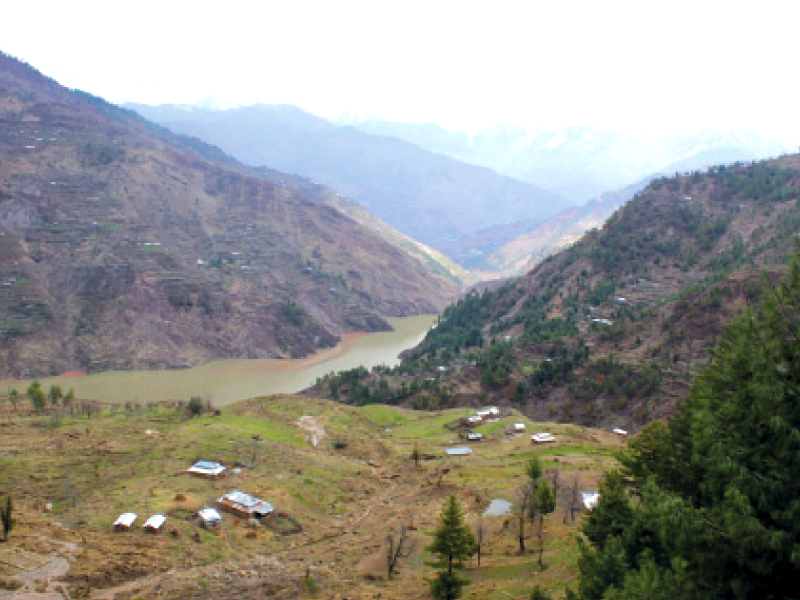 people living in the landslide prone karli village in azad kashmir await govt attention to relocate them from the area photo express