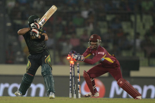 west indies wicketkeeper denesh ramdin r breaks the stumps of pakistan cricketer umar akmal l during the icc world twenty20 tournament group 2 cricket match between pakistan and west indies at the sher e bangla national cricket stadium in dhaka on april 1 2014 photo afp west indies wicketkeeper denesh ramdin r breaks the stumps of pakistan cricketer umar akmal l during the icc world twenty20 tournament group 2 cricket match between pakistan and west indies at the sher e bangla national cricket stadium in dhaka on april 1 2014 photo afp