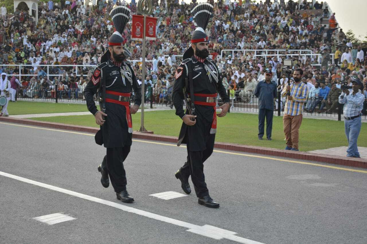 pakistan rangers personnel display their pride as well as parade skills as the crowd chants slogans of pakistan zindabad at the wagah border photo express